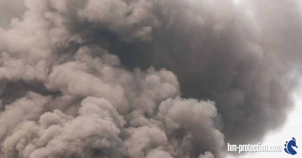 thick dark smoke from a fire