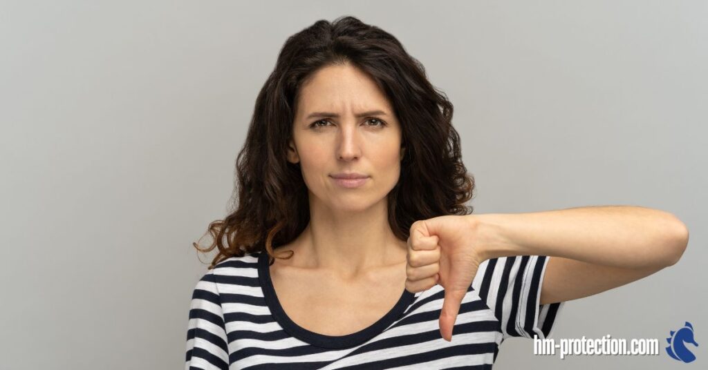 woman putting a thumbs down